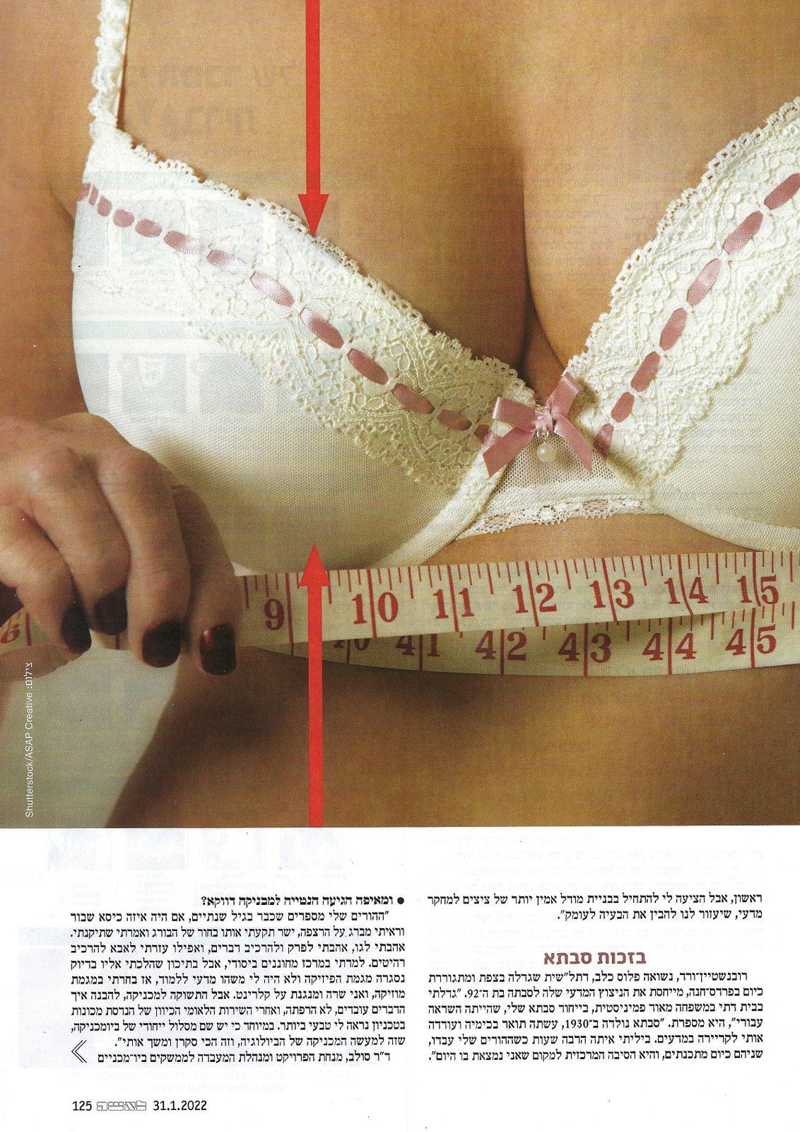 Magazine photo of a bra being measured with a tape measure